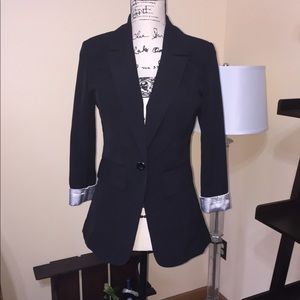 Black blazer with cuffed sleeves
